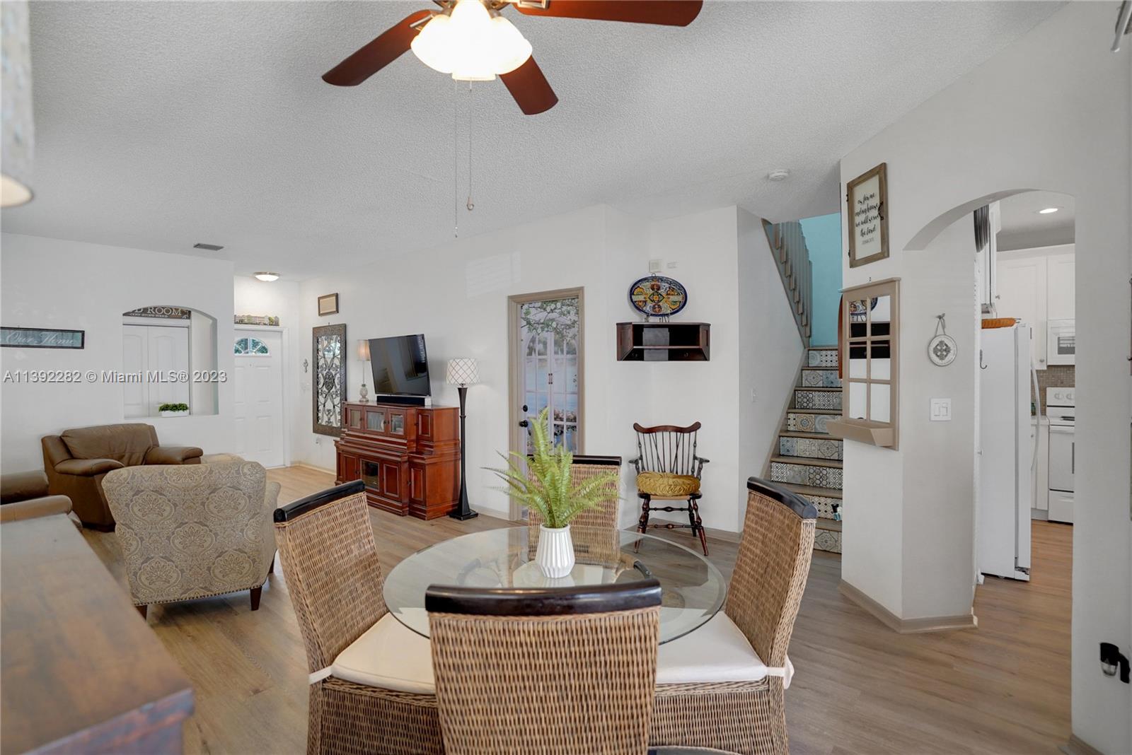 3850 Tree Top Road Cooper City, FL 33026 - Photo 6 of 34 a living room with furniture and wooden floor