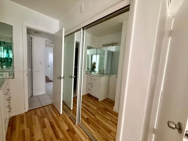 a view of a bathroom from a hallway