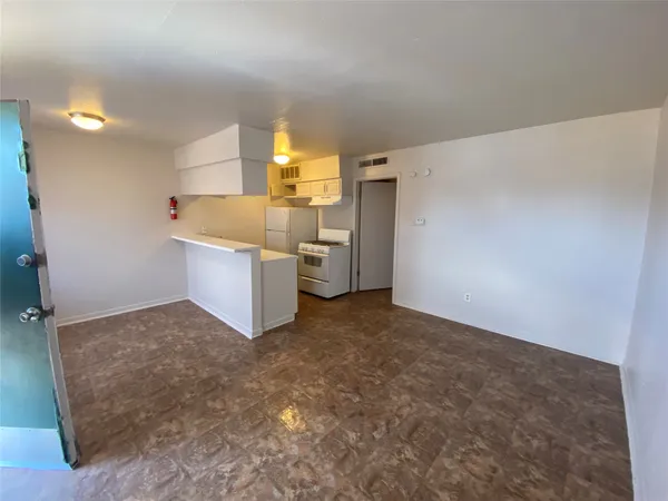 a view of a kitchen with a sink