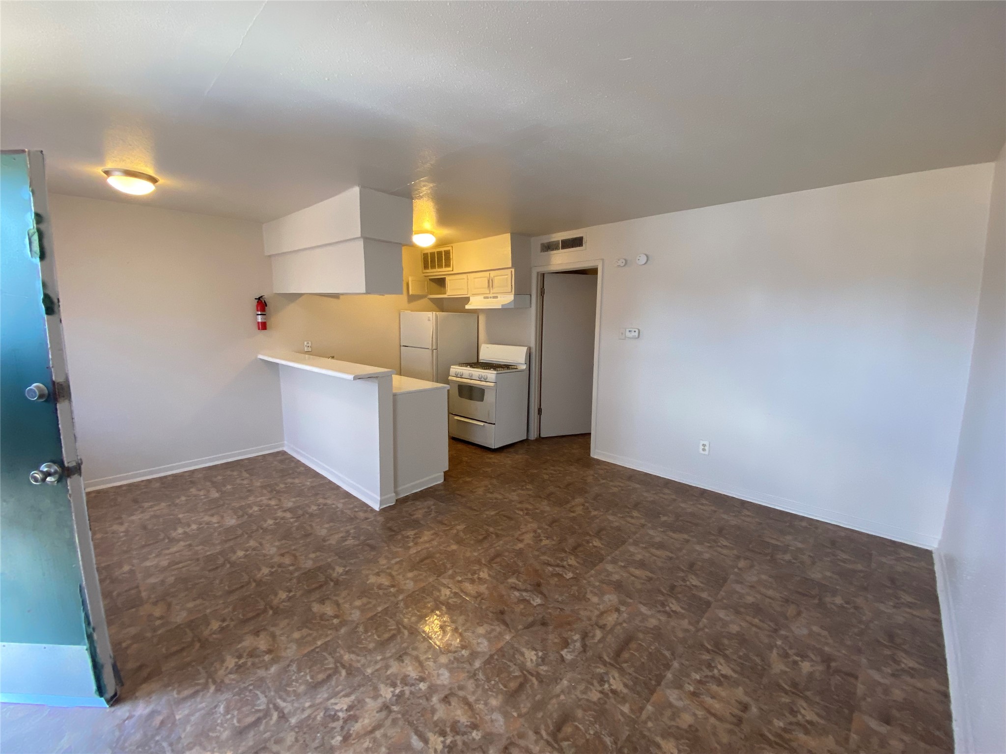 9425 Scott Street, Unit 37 Houston, TX 77051 - Photo 3 of 10 a view of a kitchen with a sink