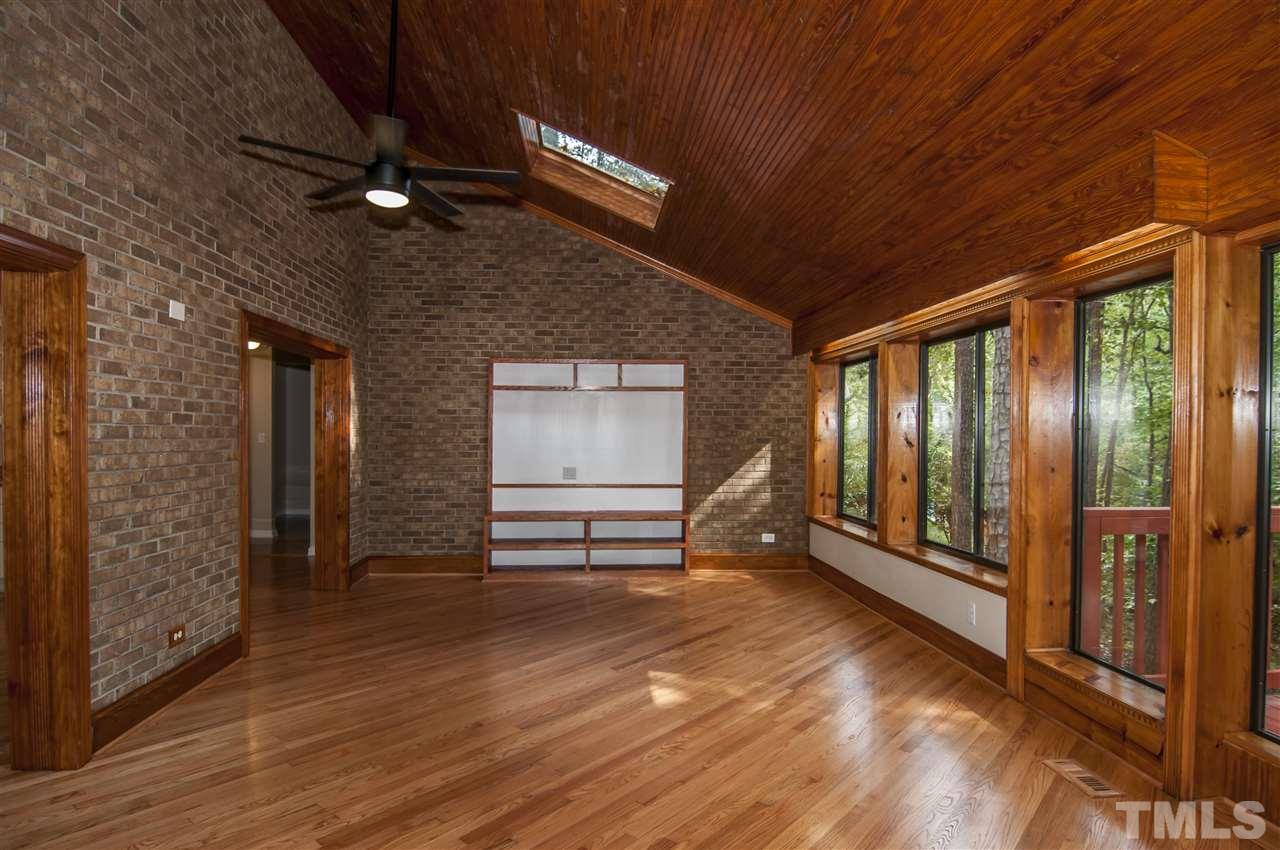 8828 Stage Ford Road Raleigh, NC 27615 - Photo 23 of 25 a view of empty room with wooden floor