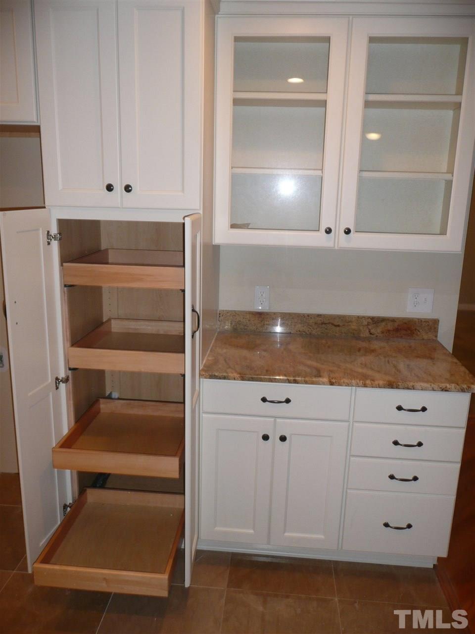 8828 Stage Ford Road Raleigh, NC 27615 - Photo 6 of 25 a view of white cabinet