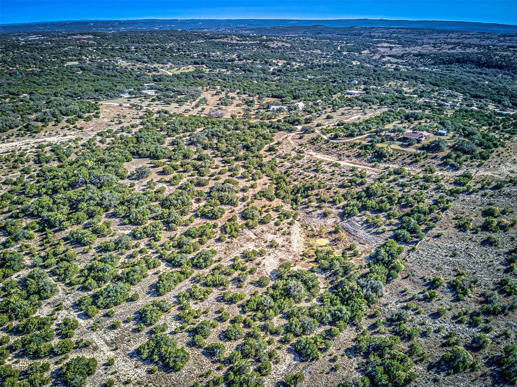 414 Hall Lane Spicewood, TX 78669 - Photo 5 of 16 an aerial view of a houses with a yard