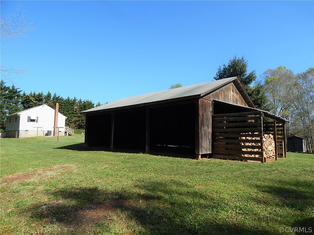 17201 Parsons Road Beaverdam, VA 23015 - Photo 13 of 19 a view of a house with a yard