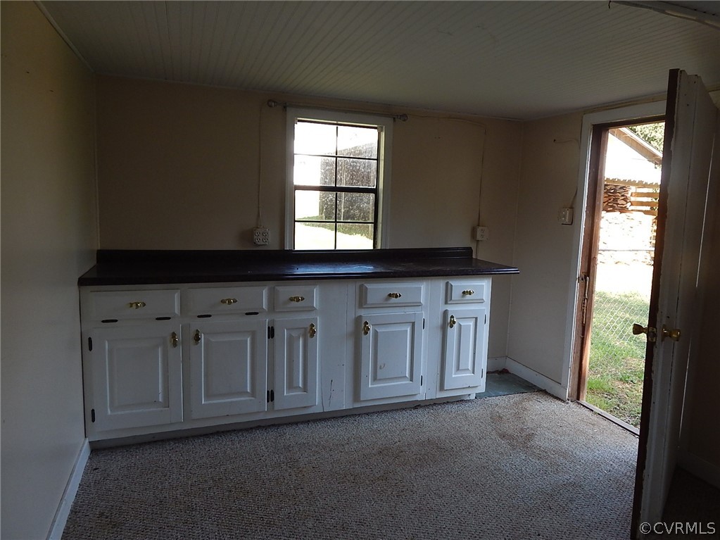 17201 Parsons Road Beaverdam, VA 23015 - Photo 17 of 19 an empty room with windows