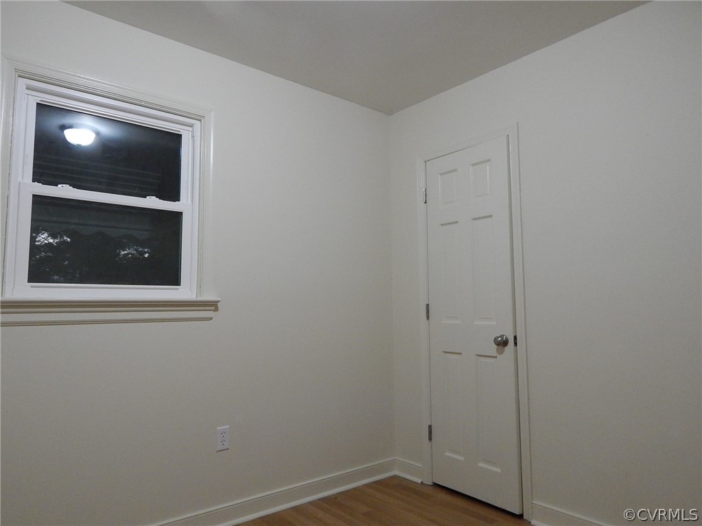 17201 Parsons Road Beaverdam, VA 23015 - Photo 9 of 19 a view of an empty room with closet and mirror