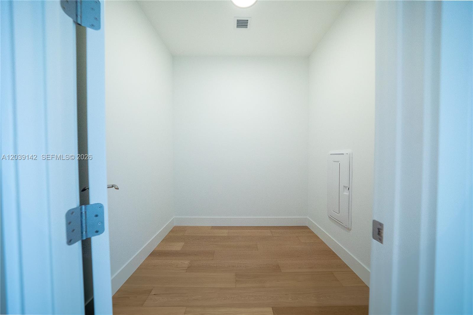 175 Southeast 25th Road, Unit 702 Miami, FL 33129 - Photo 6 of 30 a view of a room with wooden floor