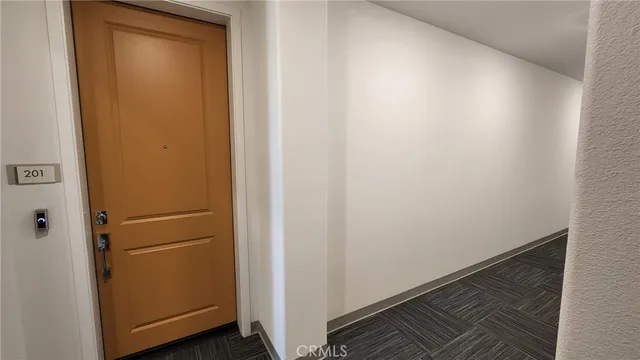 a black and white photo of a refrigerator