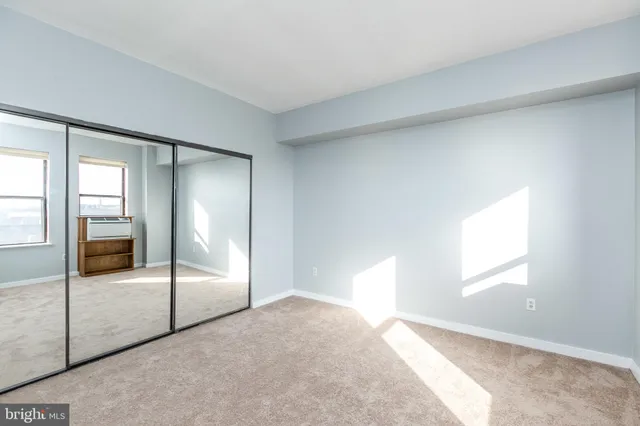 a bathroom with a sink and a window