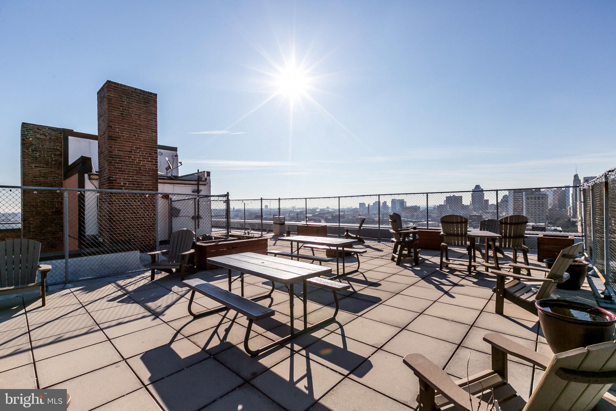 1001 St Paul Street, Unit 6G Baltimore, MD 21202 - Photo 24 of 32 a view of a terrace with chairs