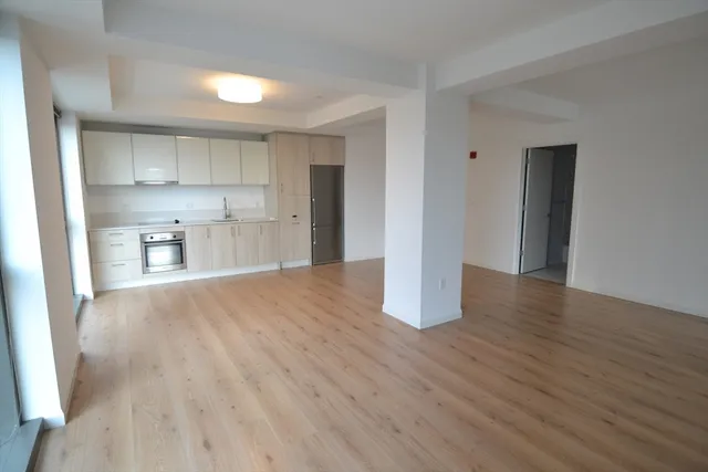 a view of a kitchen with electric appliances