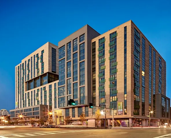 a front view of a building with a street