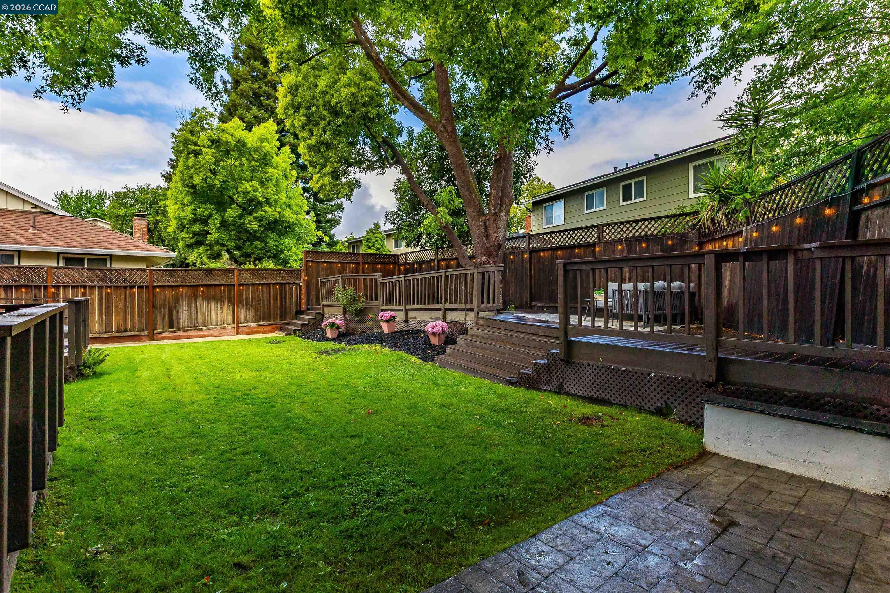 418 Devon Court San Ramon, CA 94583 - Photo 45 of 62 a view of a chair and table in backyard