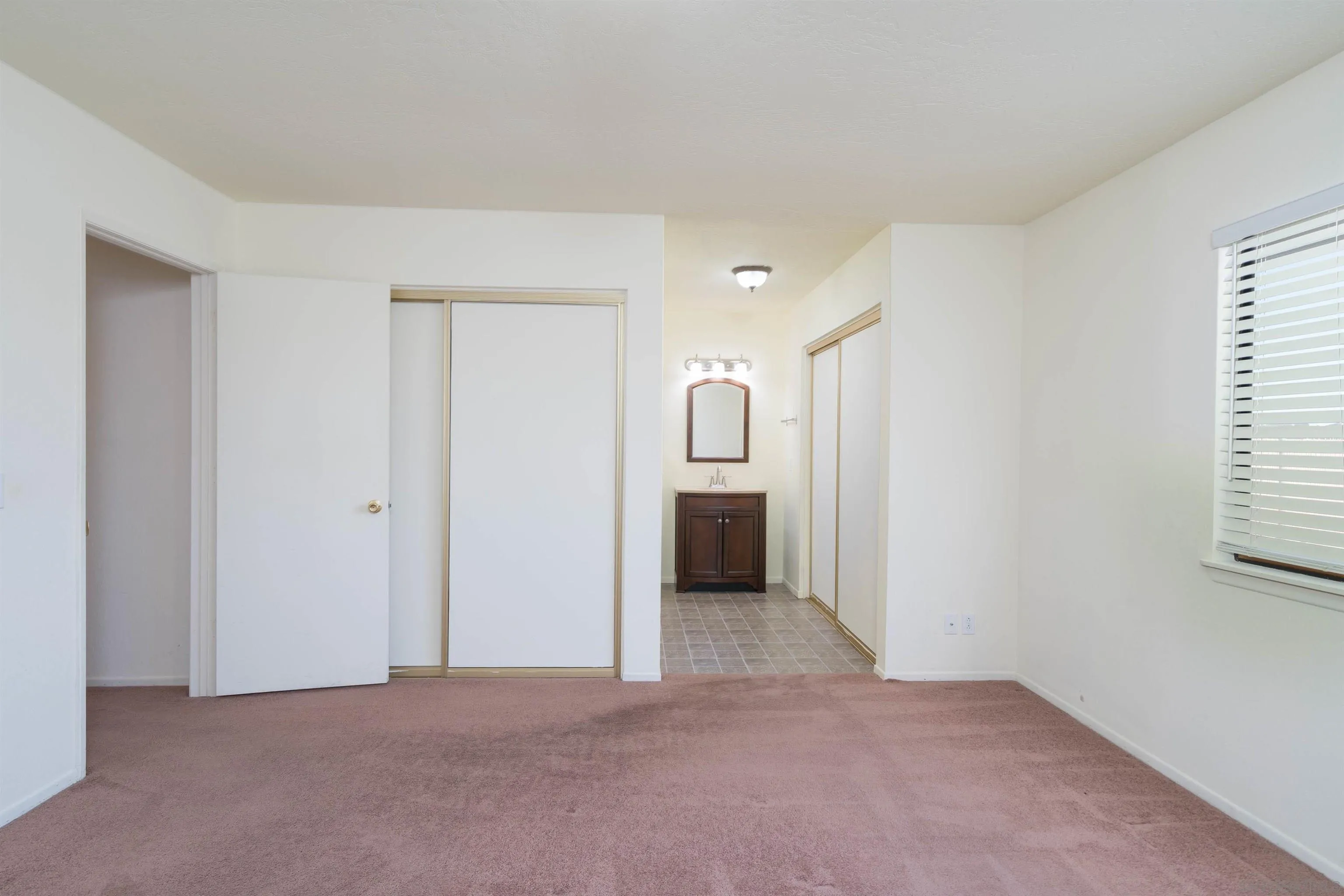 11341 Chimayo Road Apple Valley, CA 92308 - Photo 13 of 27 a view of a hallway with a room
