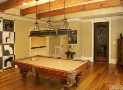 3120 Cone Manor Lane Raleigh, NC 27613 - Photo 10 of 11 Open bonus room with Australian chestnut floors, hand hewn beams and adjoining wine room Other