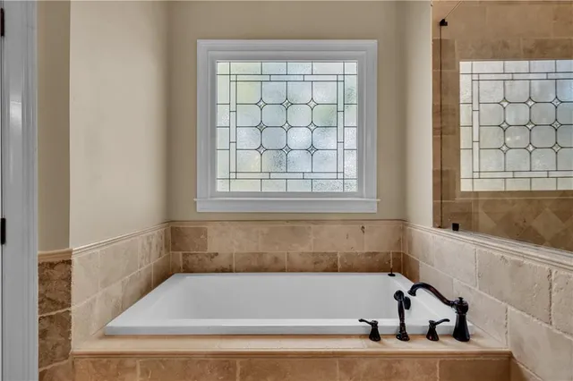 a view of swimming pool with a yard