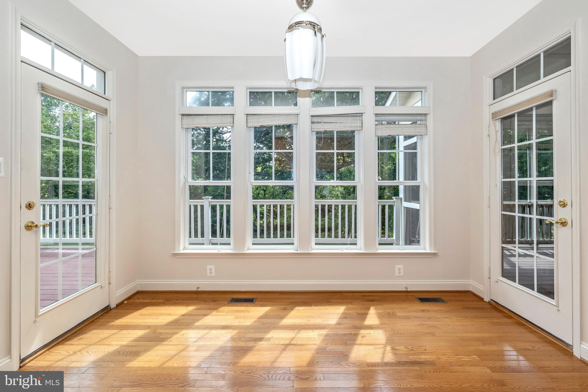 2689 Brook Valley Road Frederick, MD 21701 - Photo 15 of 94 Sunny Breakfast Room with Hardwood Flooring