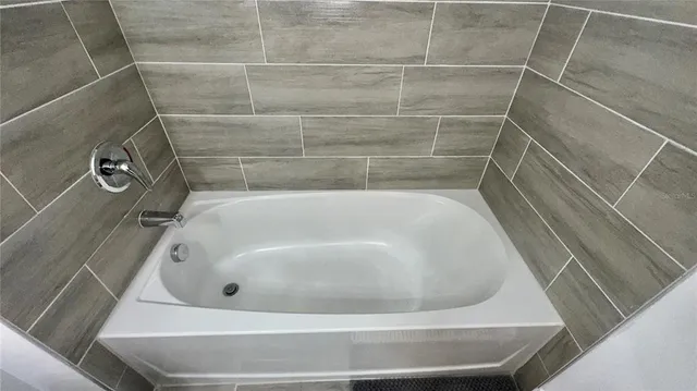 a bathroom with a bathtub