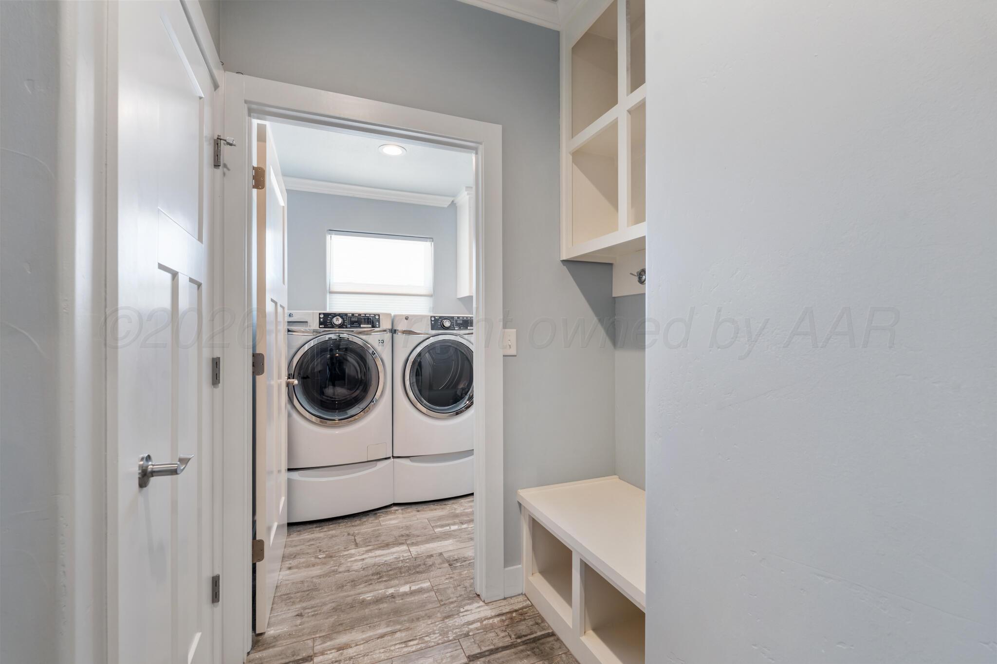 6550 Arnot Road Amarillo, TX 79119 - Photo 13 of 19 a utility room with dryer and washer