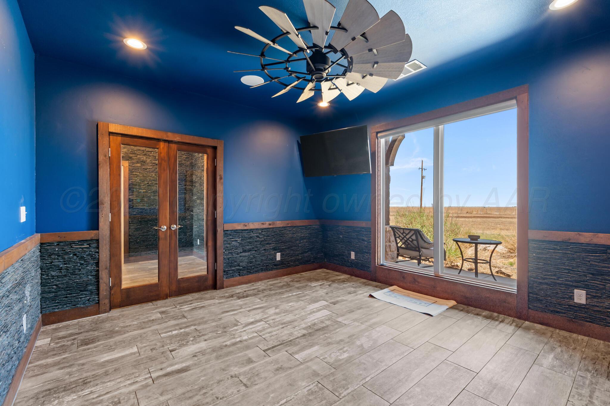 6550 Arnot Road Amarillo, TX 79119 - Photo 7 of 19 a view of an empty room with a window