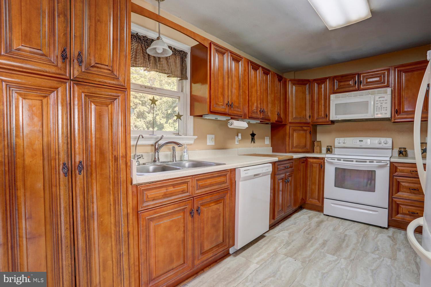732 Conowingo Road Quarryville, PA 17566 - Photo 16 of 33 Fantastic wood cabinets with lots of storage.