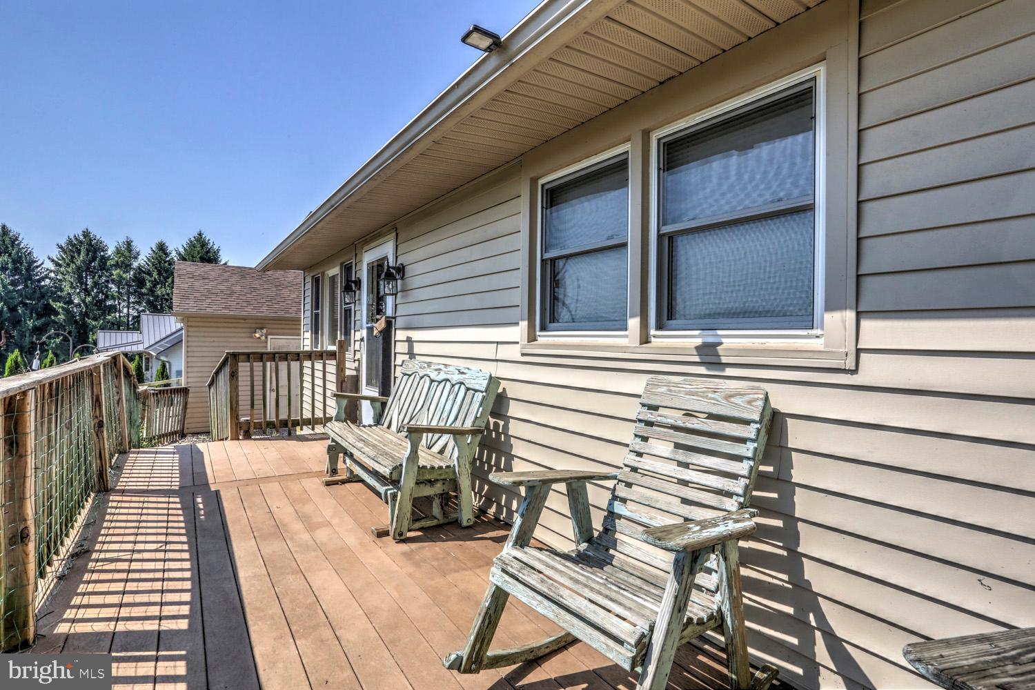 732 Conowingo Road Quarryville, PA 17566 - Photo 4 of 33 Enjoy the country views on the porch.