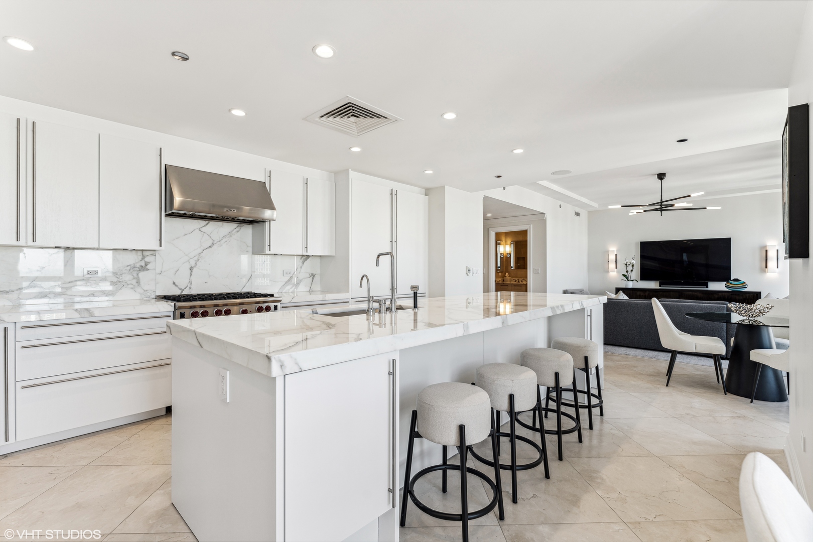 11 East Walton Street, Unit 4202 Chicago, IL 60611 - Photo 16 of 48 a kitchen with appliances a sink and cabinets