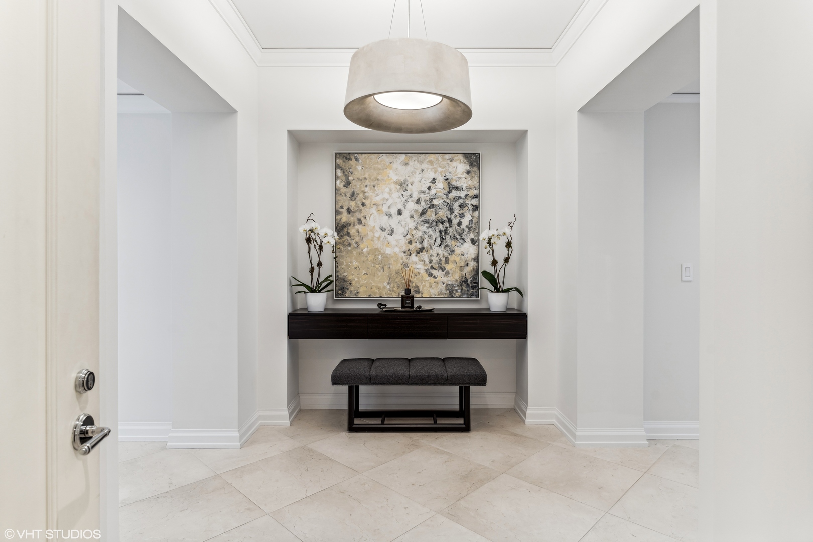 11 East Walton Street, Unit 4202 Chicago, IL 60611 - Photo 2 of 48 a living room with furniture and a wall painting