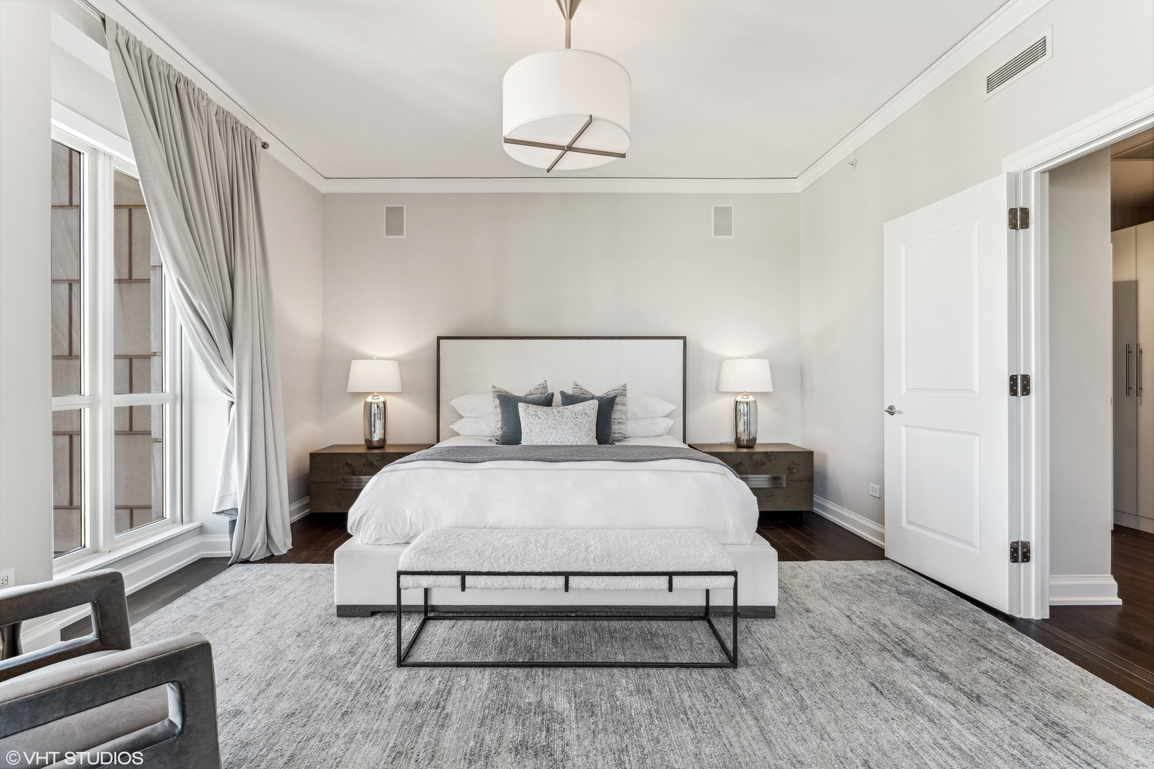 11 East Walton Street, Unit 4202 Chicago, IL 60611 - Photo 22 of 48 a bedroom with a bed and window