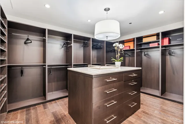 a kitchen with a refrigerator and countertop