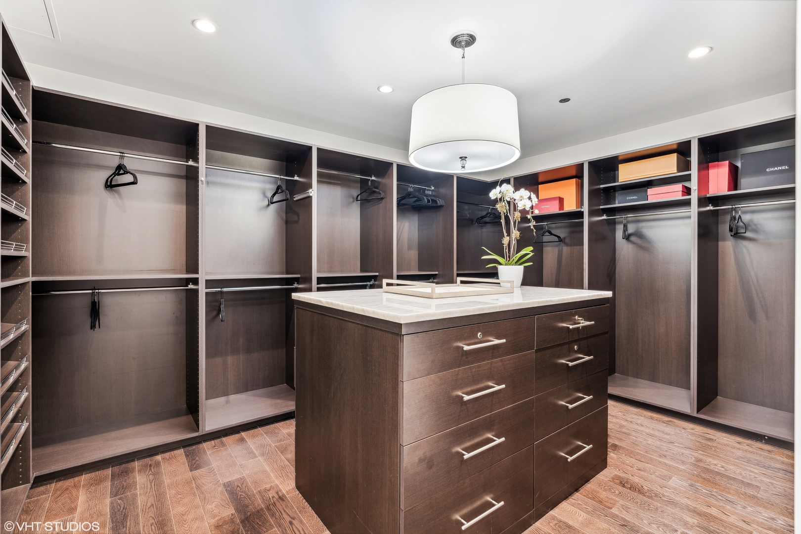 11 East Walton Street, Unit 4202 Chicago, IL 60611 - Photo 30 of 48 a kitchen with a refrigerator and countertop