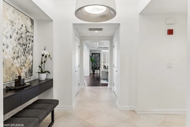 a view of a hallway view with staircase