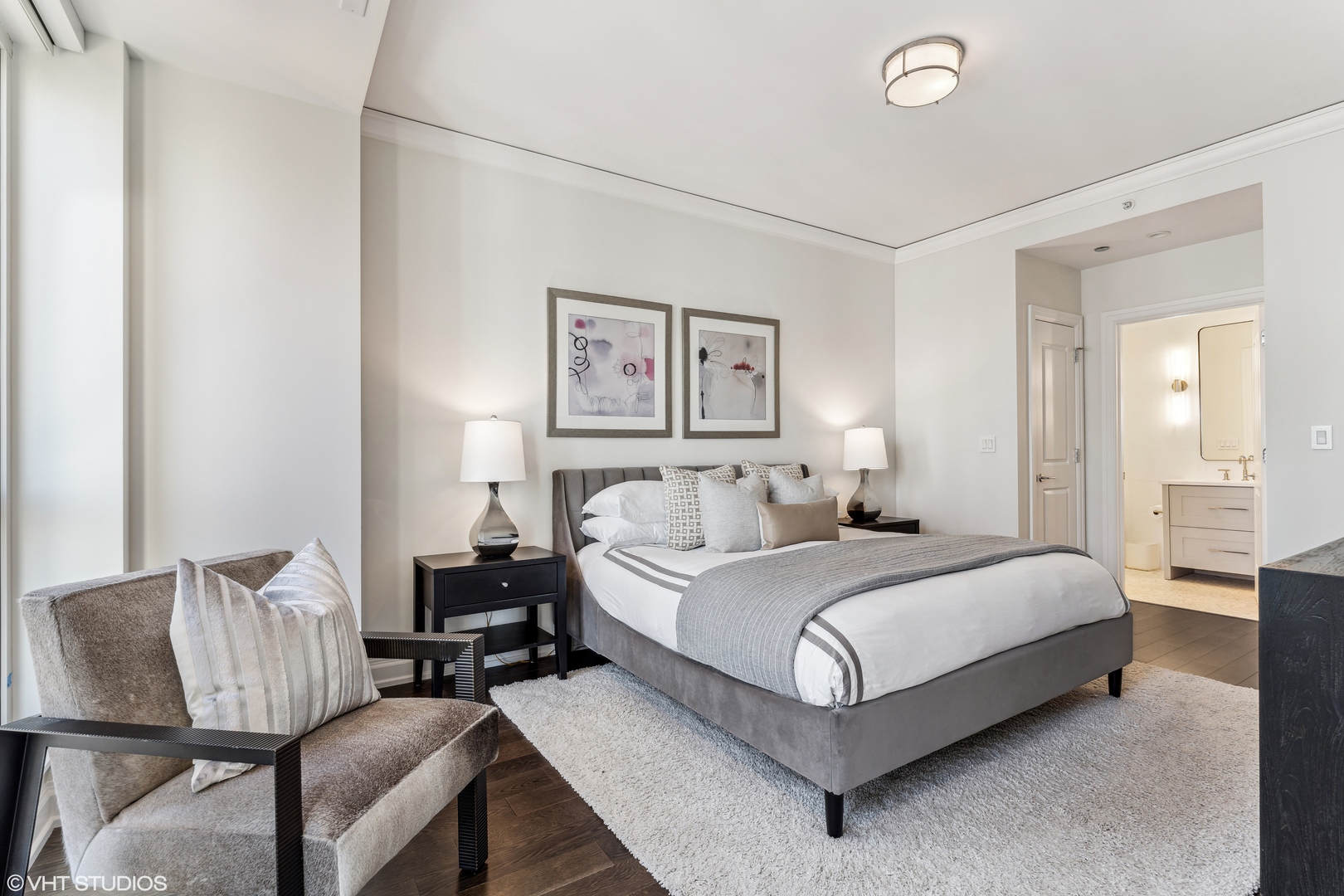 11 East Walton Street, Unit 4202 Chicago, IL 60611 - Photo 35 of 48 a bedroom with a bed and furniture