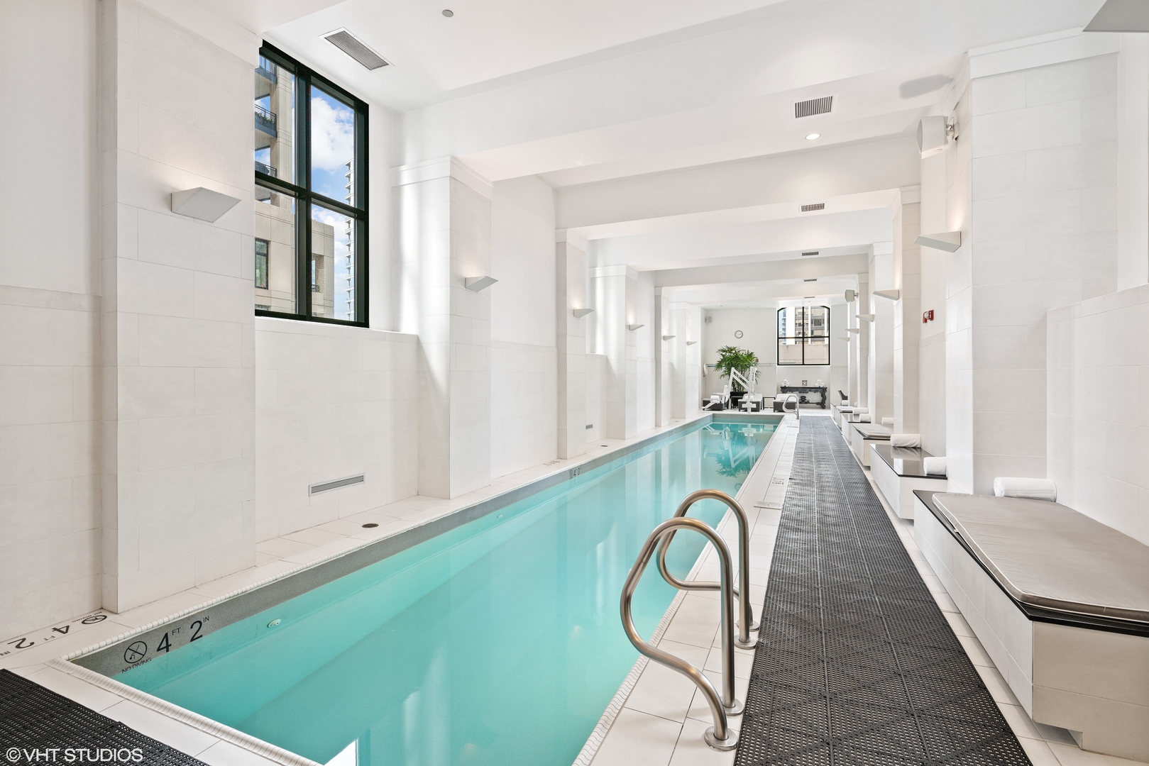 11 East Walton Street, Unit 4202 Chicago, IL 60611 - Photo 45 of 48 a swimming pool with view of living room