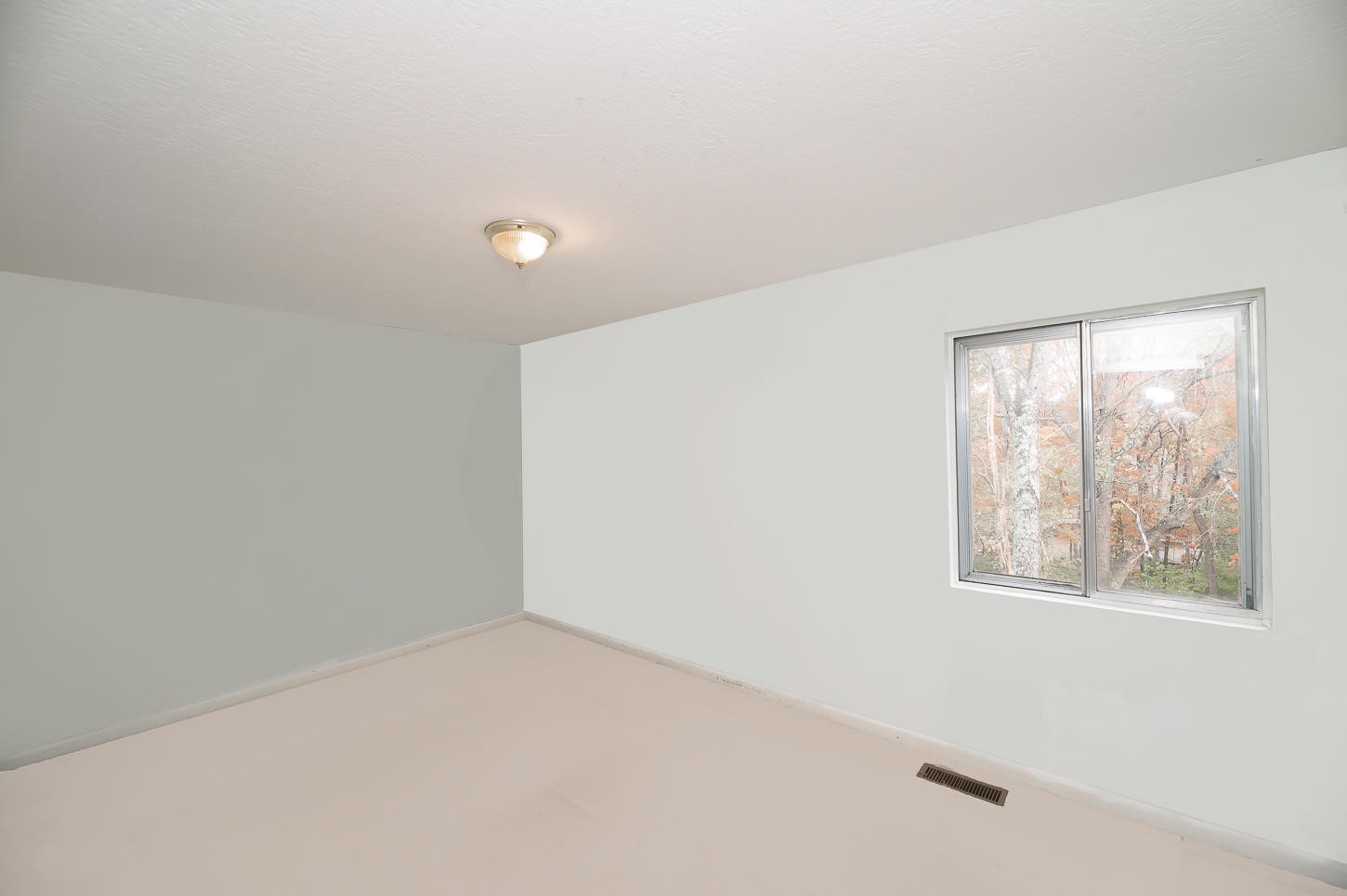 2224 Roundtree Road Knoxville, TN 37923 - Photo 12 of 22 a view of an empty room with a window