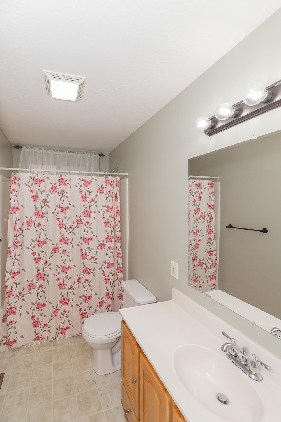 2224 Roundtree Road Knoxville, TN 37923 - Photo 10 of 22 a bathroom with a sink toilet and shower