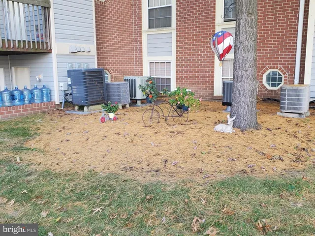 a backyard of a house with seating space