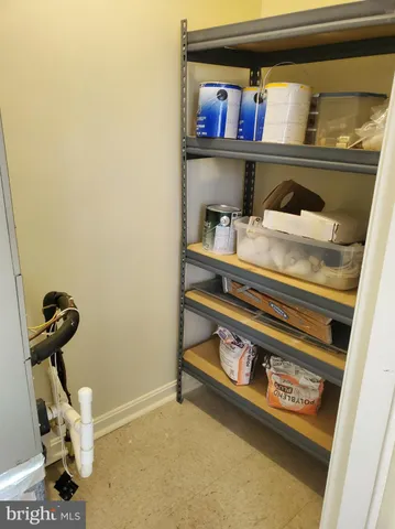 a view of swimming pool with a yard