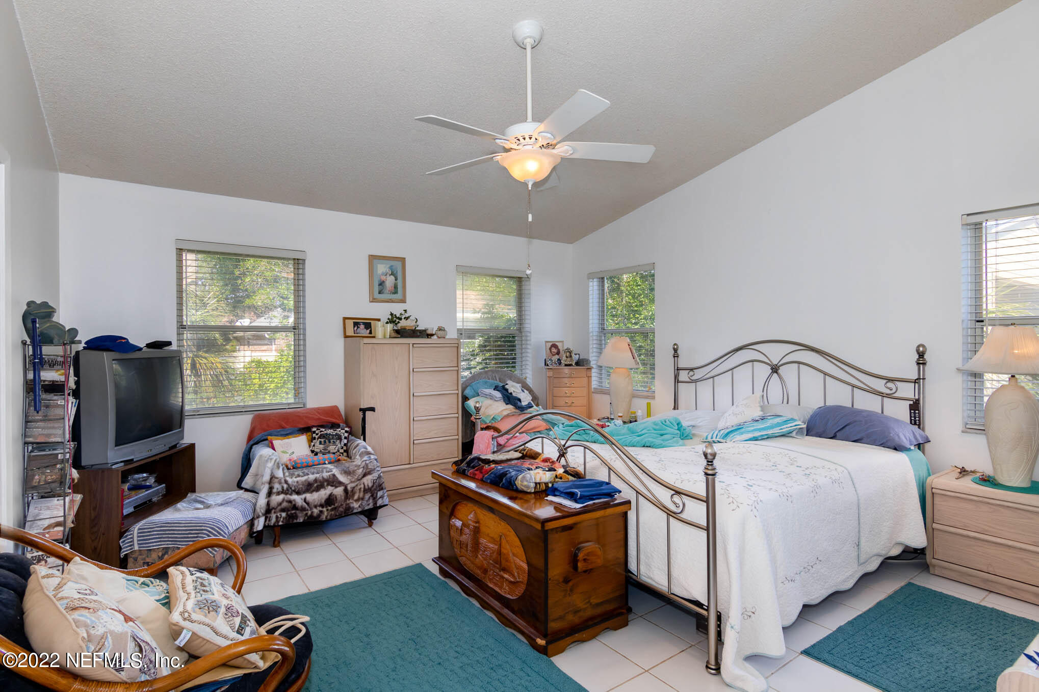 7047 Rivercrest Drive Jacksonville, FL 32226 - Photo 15 of 29 a bedroom with bed and a large window