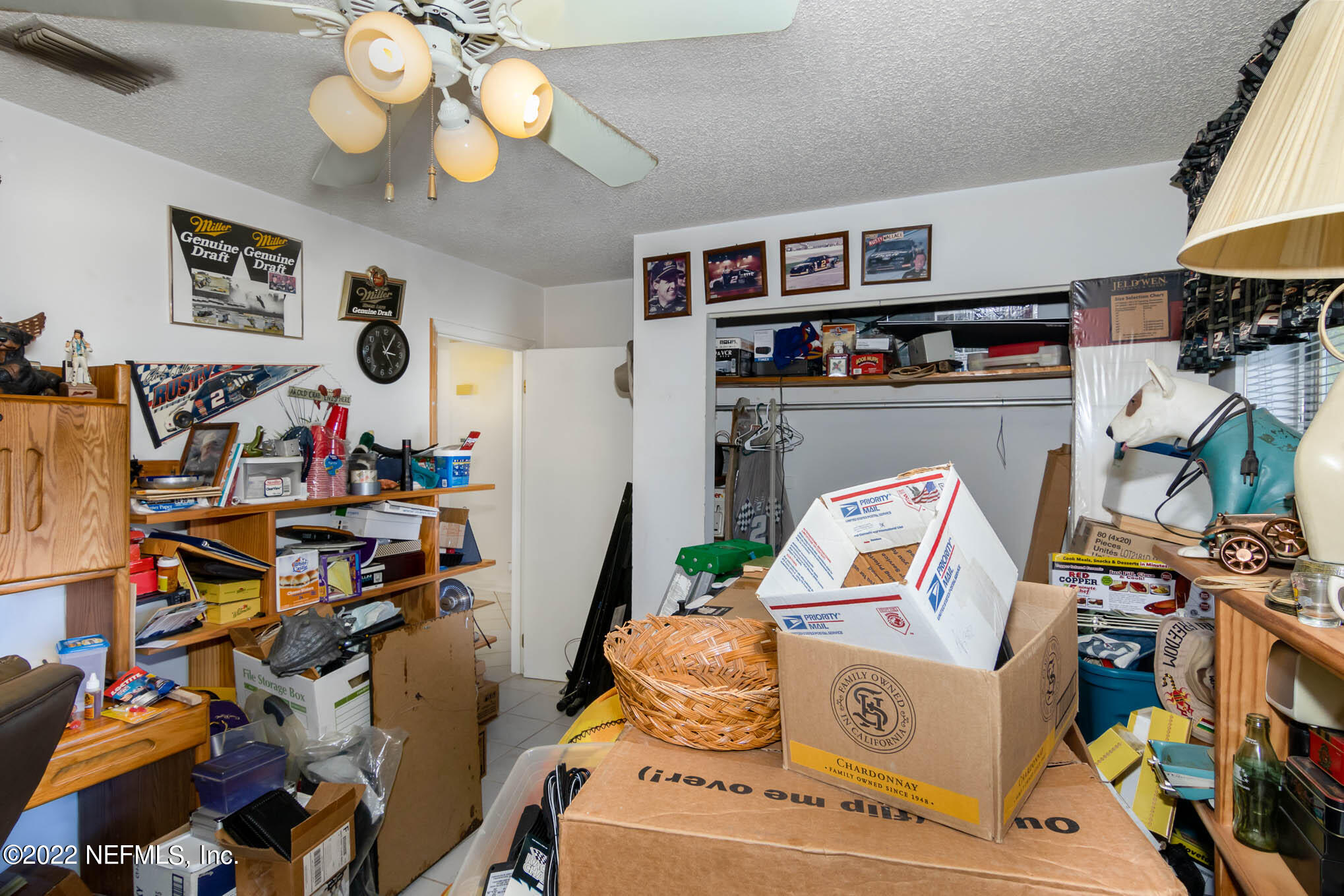 7047 Rivercrest Drive Jacksonville, FL 32226 - Photo 21 of 29 a living room with furniture and a flat screen tv