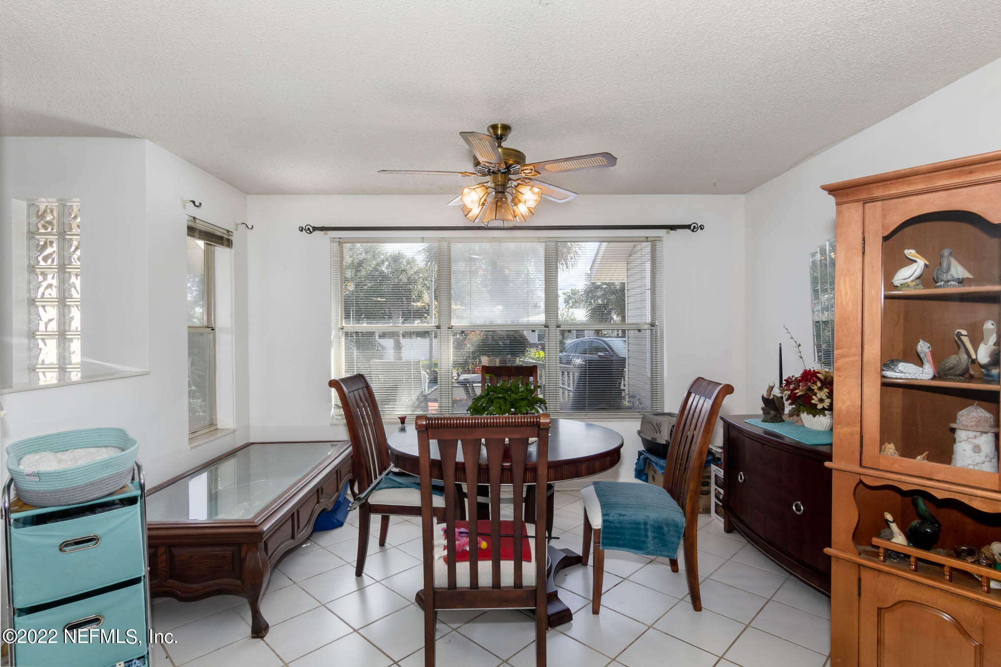 7047 Rivercrest Drive Jacksonville, FL 32226 - Photo 7 of 29 a view of a dining room with furniture window and outside view
