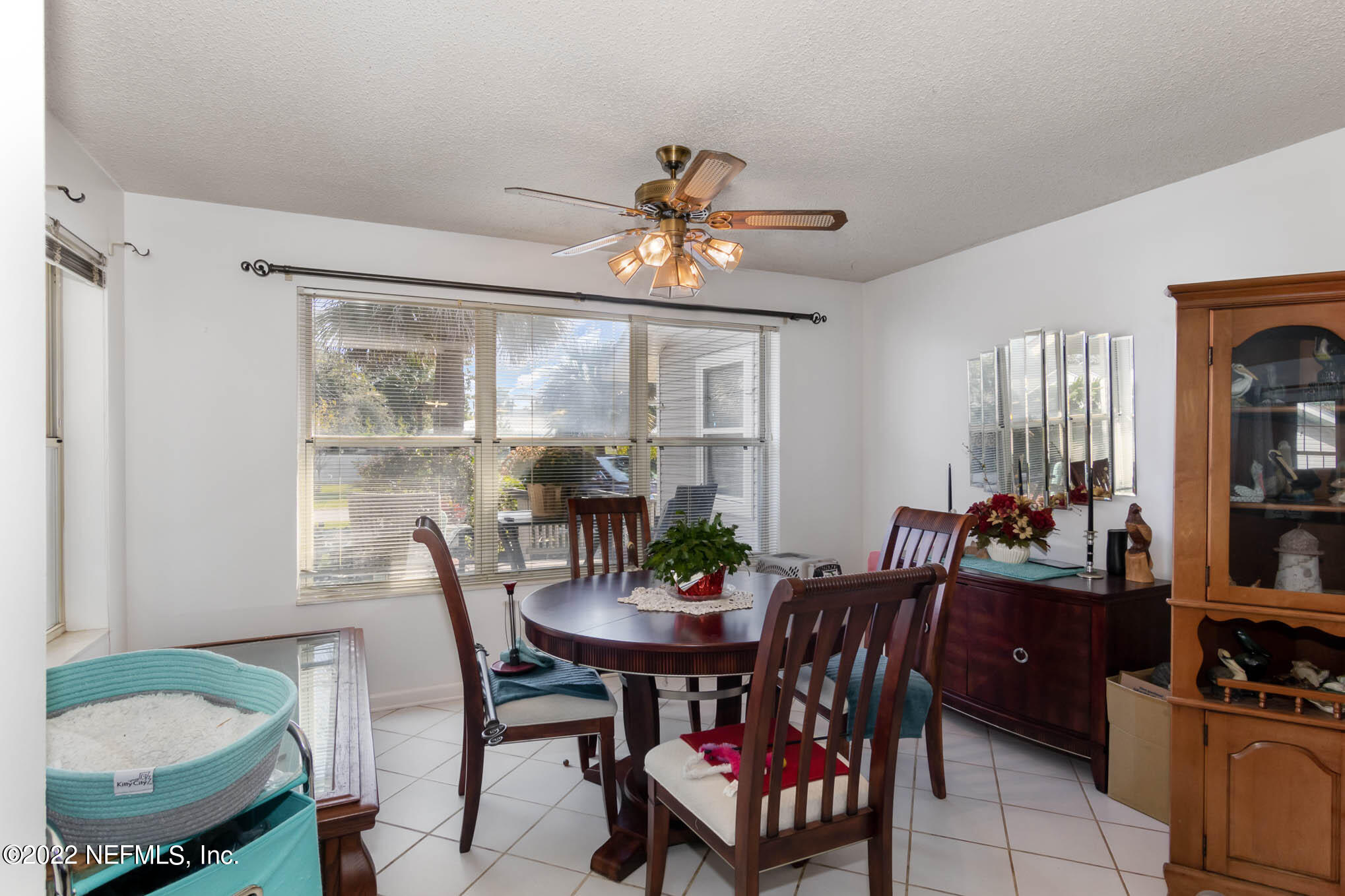 7047 Rivercrest Drive Jacksonville, FL 32226 - Photo 8 of 29 a view of a dining room with furniture window and outside view