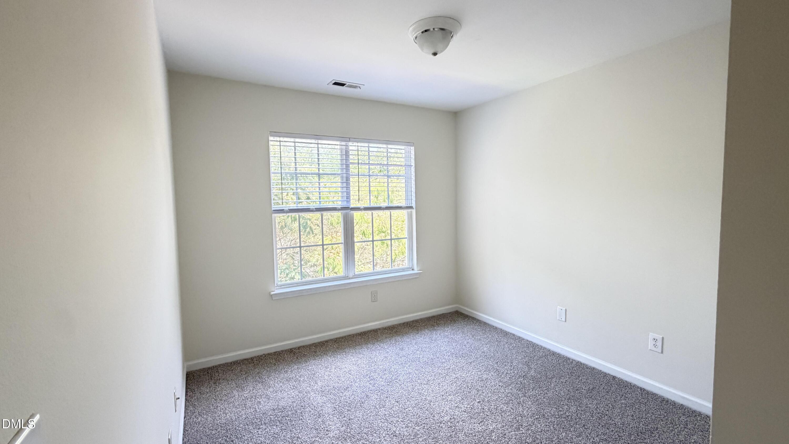 4123 Standing Rock Way Raleigh, NC 27604 - Photo 20 of 29 an empty room with a window