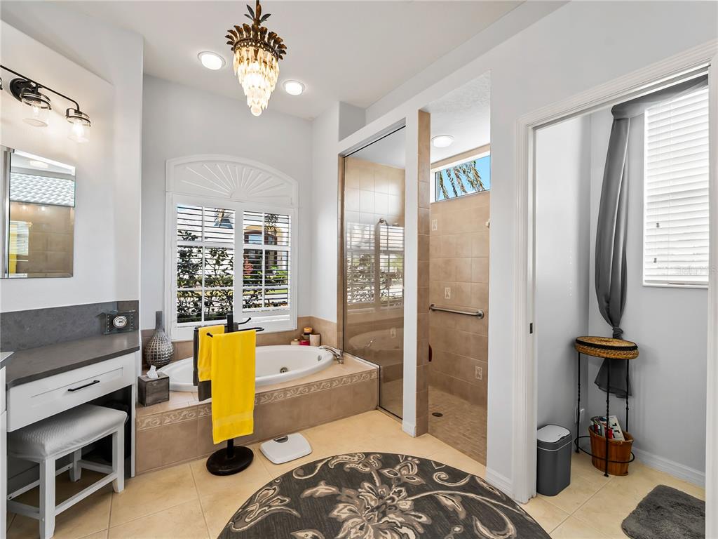 918 Chickadee Drive Venice, FL 34285 - Photo 21 of 85 a living room with furniture and a chandelier