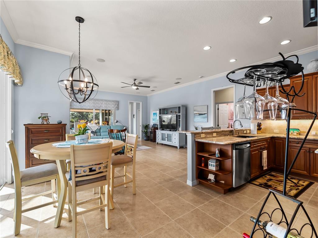 918 Chickadee Drive Venice, FL 34285 - Photo 25 of 85 a view of a dining room with furniture