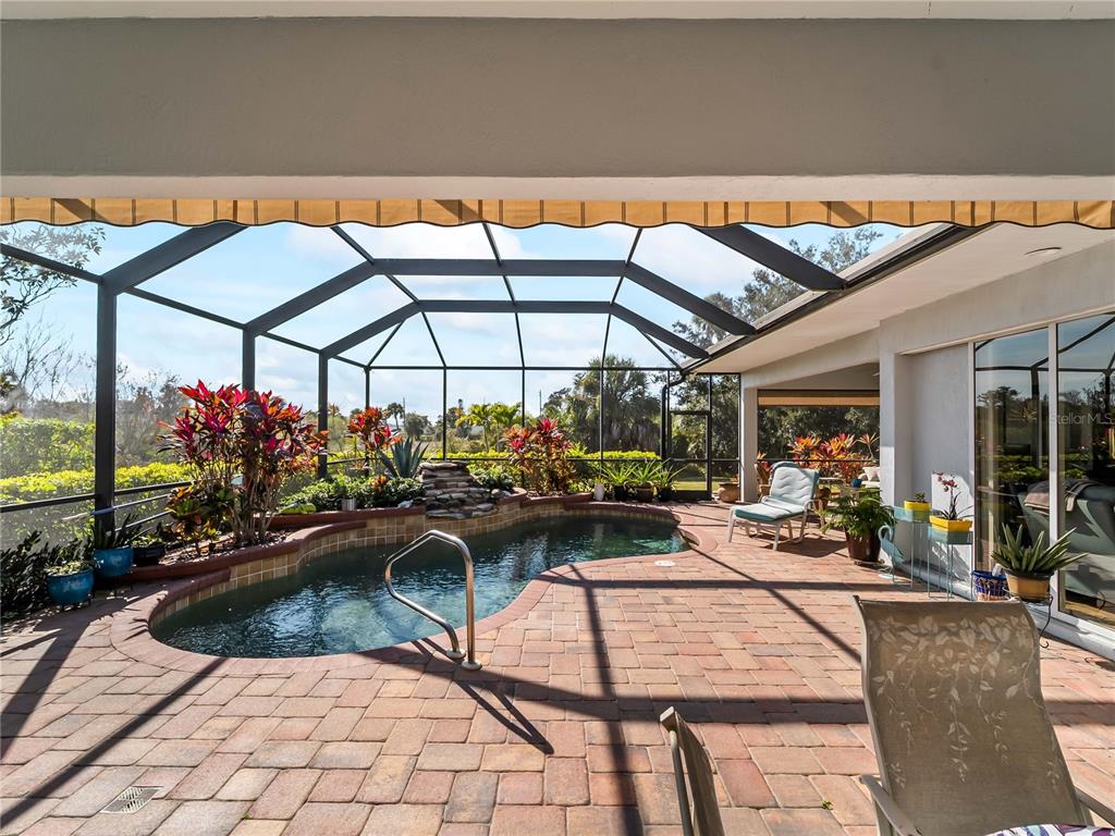 918 Chickadee Drive Venice, FL 34285 - Photo 49 of 85 a view of a chairs and table in the patio