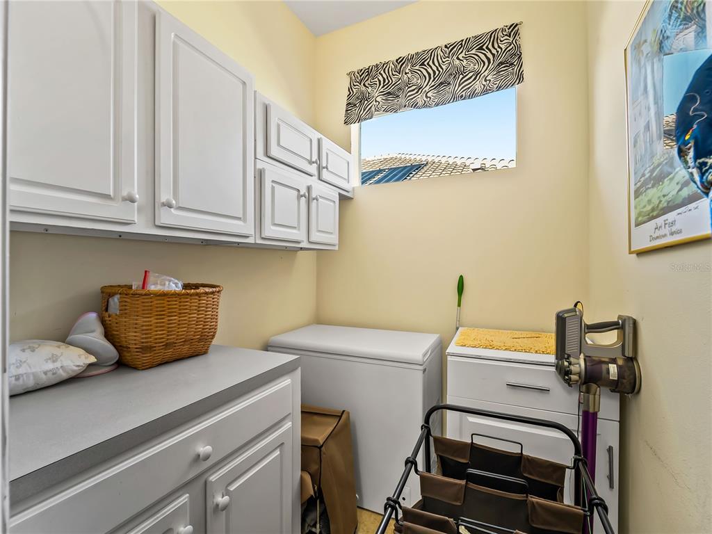 918 Chickadee Drive Venice, FL 34285 - Photo 56 of 85 a view of a room with storage and utility