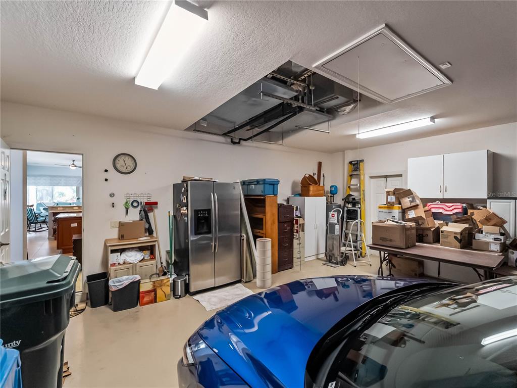 918 Chickadee Drive Venice, FL 34285 - Photo 58 of 85 a bed room with a bed and a gym equipment