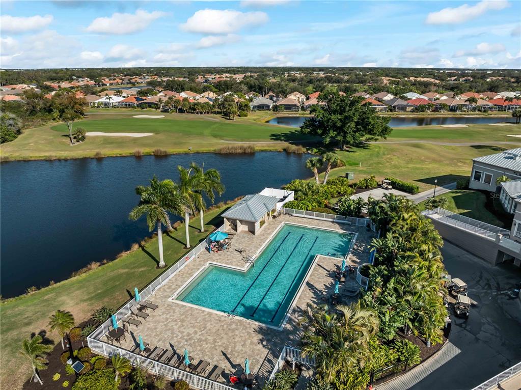 918 Chickadee Drive Venice, FL 34285 - Photo 69 of 85 an aerial view of a houses with ocean view