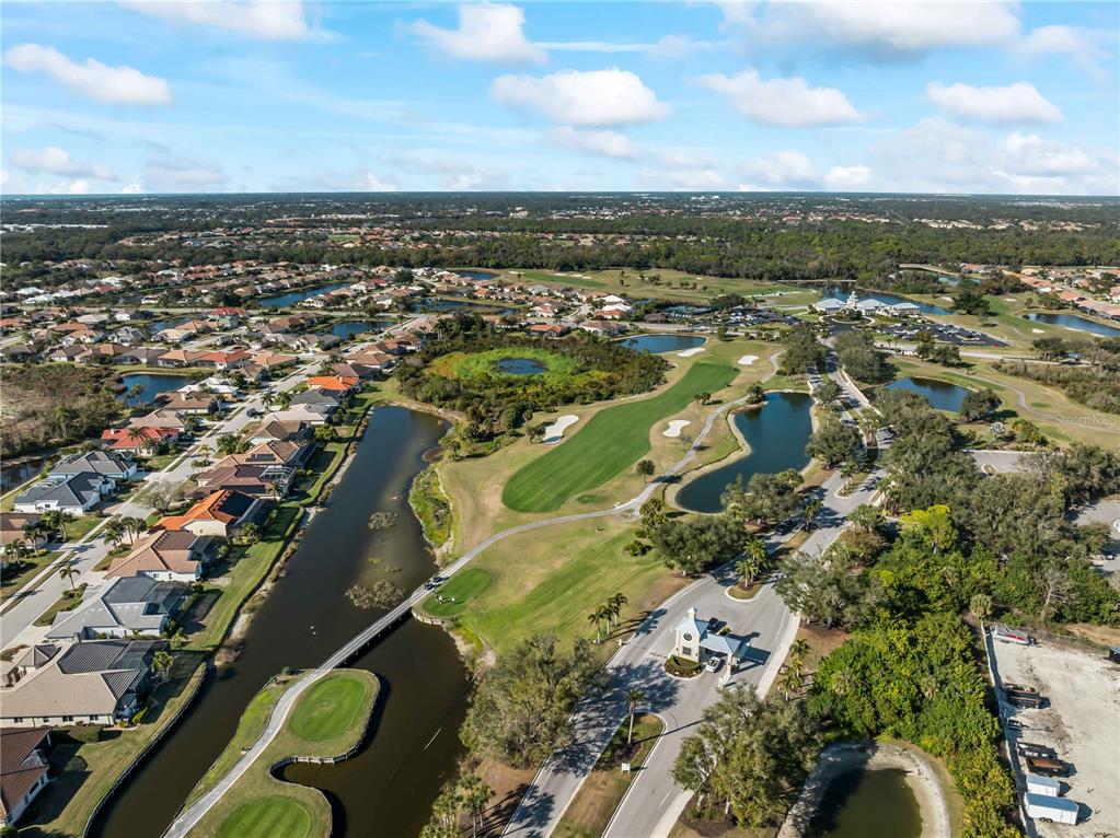 918 Chickadee Drive Venice, FL 34285 - Photo 72 of 85 an aerial view of a residential houses with city view